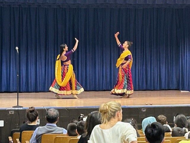 Ajna Dance Company — students watching cultural performance
